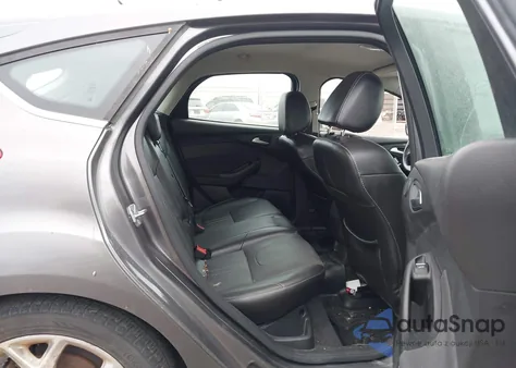 2014 Ford Focus Titanium from USA, damaged, VIN 1FADP3N25EL143272